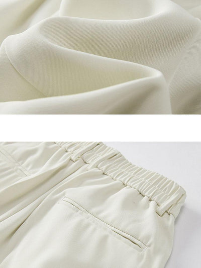Baladeva® | Slit Hem Pleated Trousers